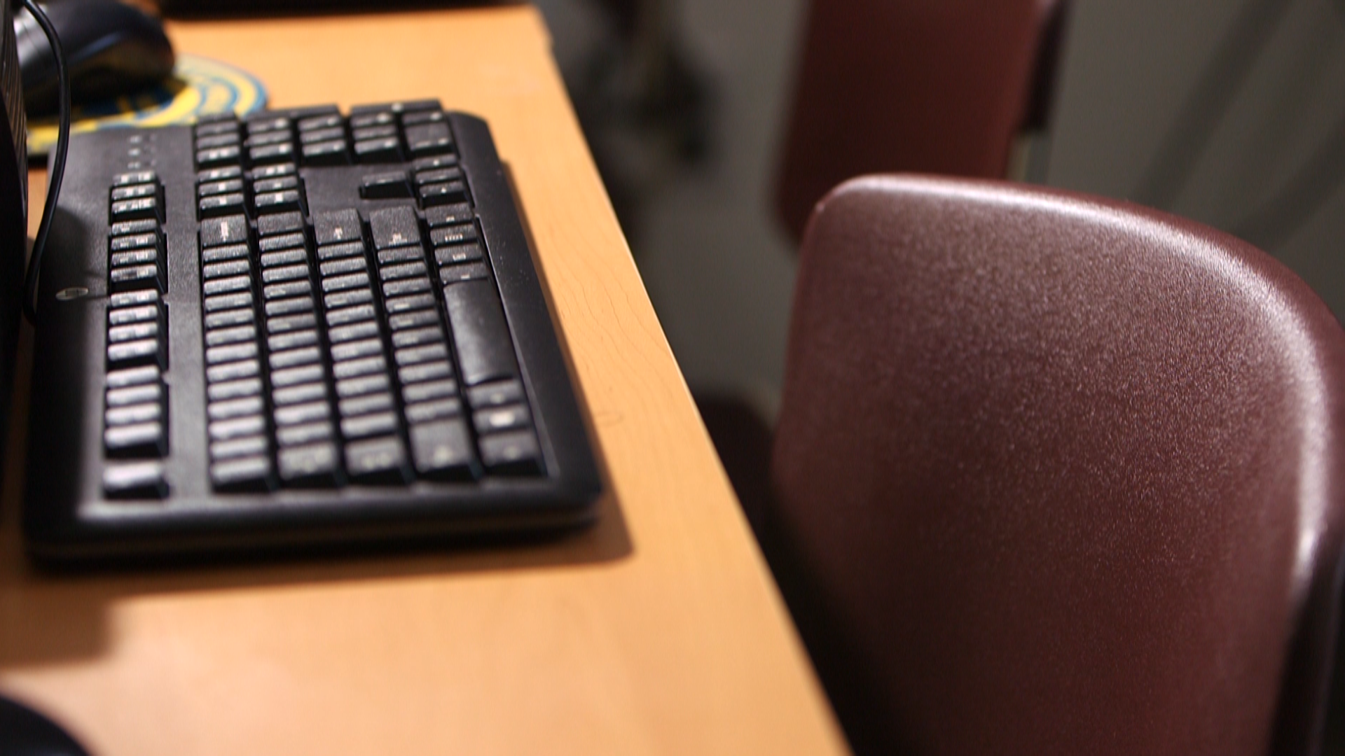 Chair, table and computer keyboard